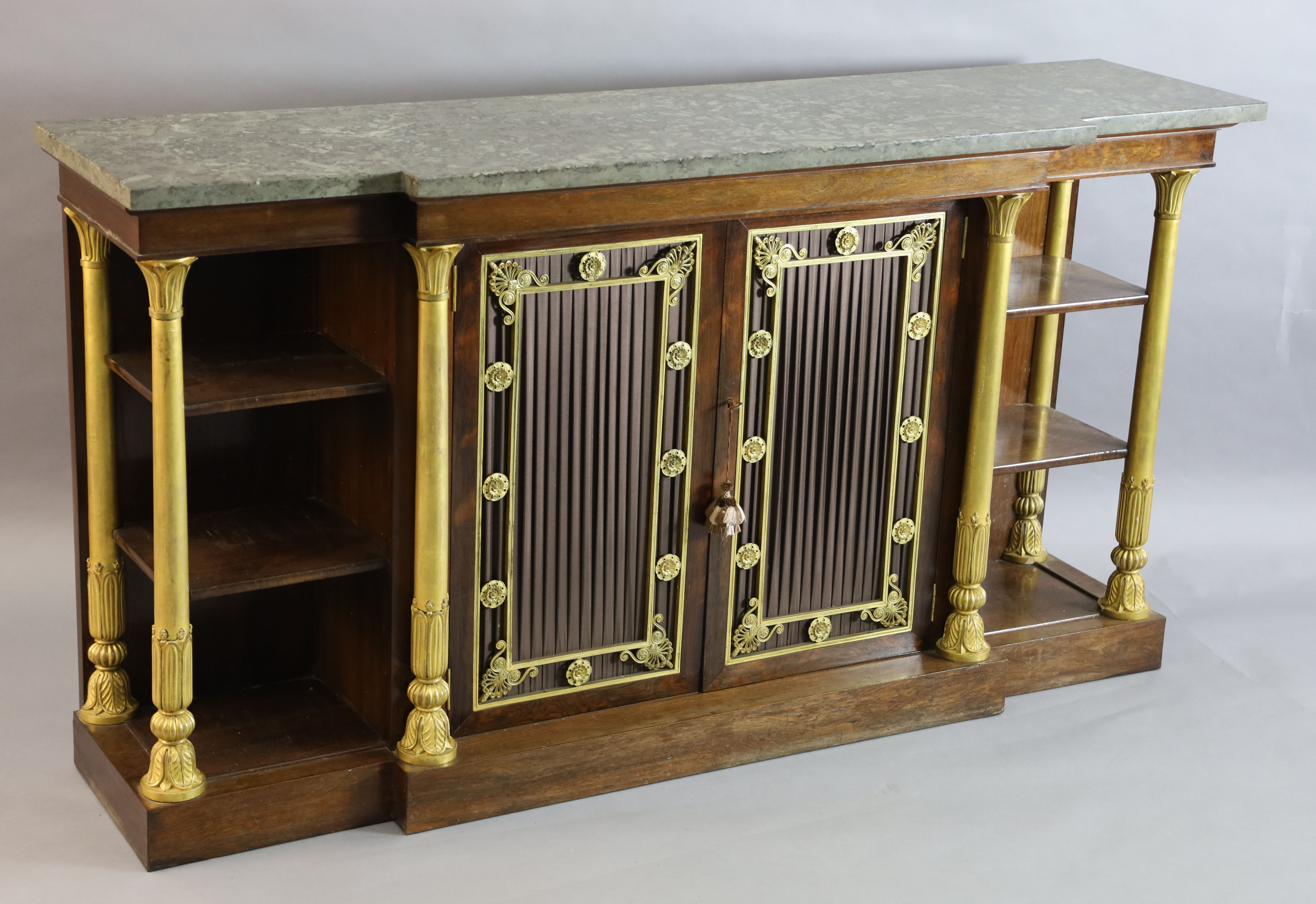 A Regency ormolu mounted rosewood breakfront side cabinet, W.5ft 9in. D.1ft 6in. H.3ft 2in.